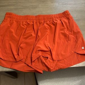 Burnt orange Lululemon Track That 5” shorts size 20